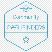 png-transparent-travel-blue-organization-lonely-planet-logo-business-badge-angle-magazine